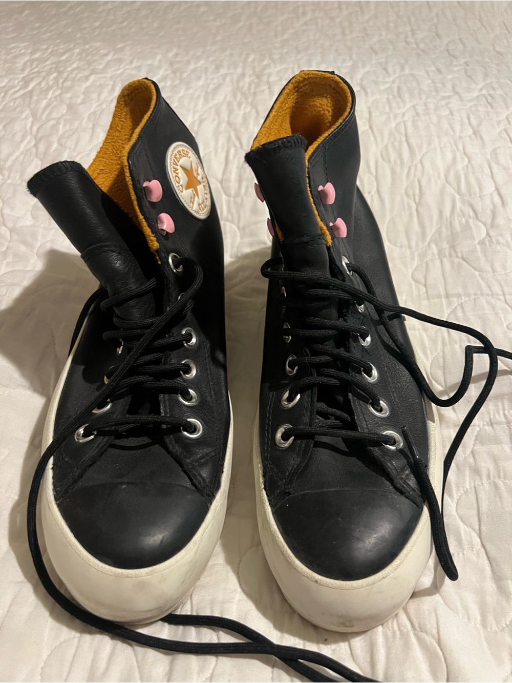 Converse Women's Black High-Top Sneakers with Pink Eyelets and Gold Interior